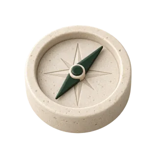 Limestone compass with a dark green enamel needle