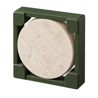A limestone disc held within a fixed green frame